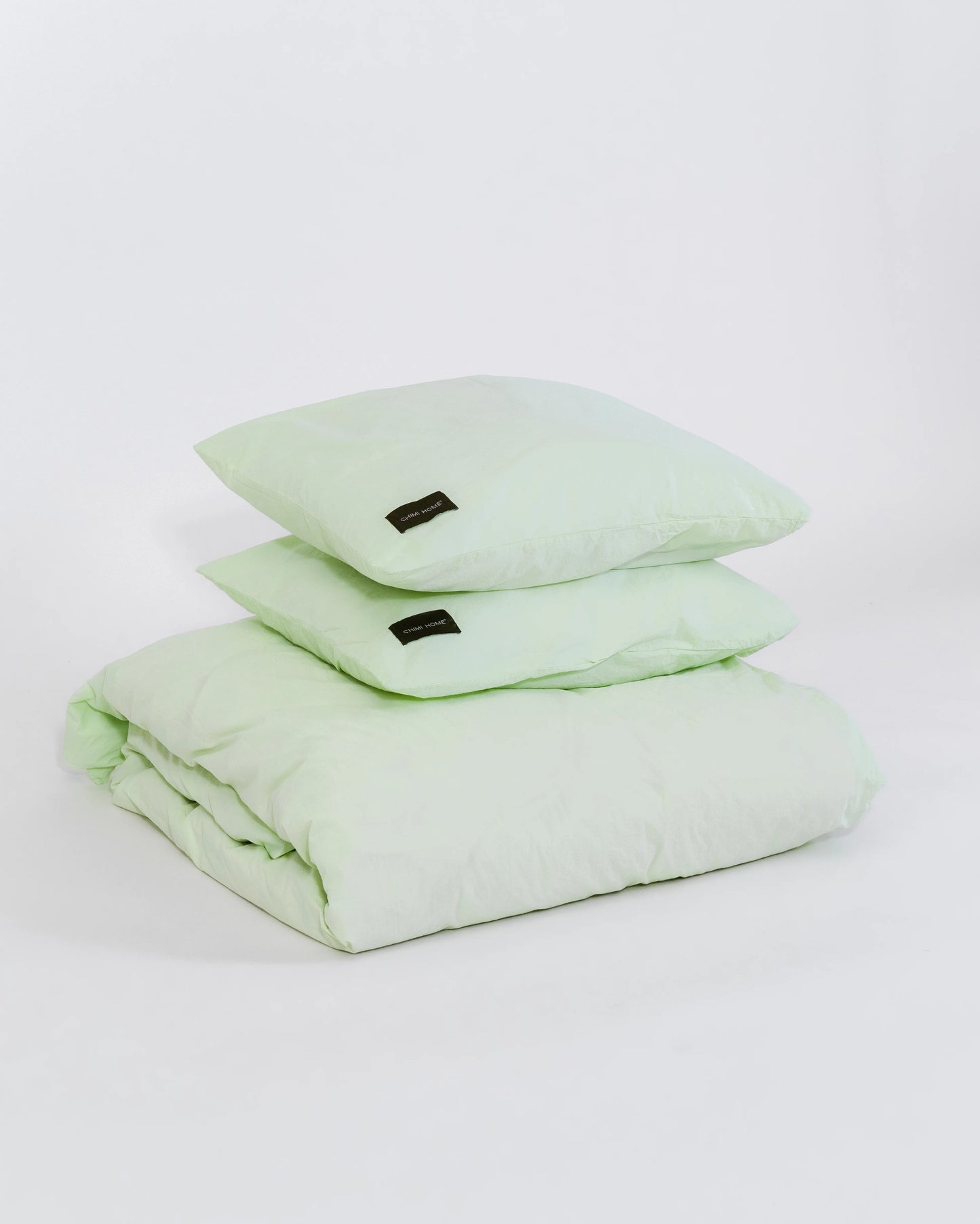 ljusgrön-sängkläder-produktbild-chimi-home-örngott-rainbow-collection