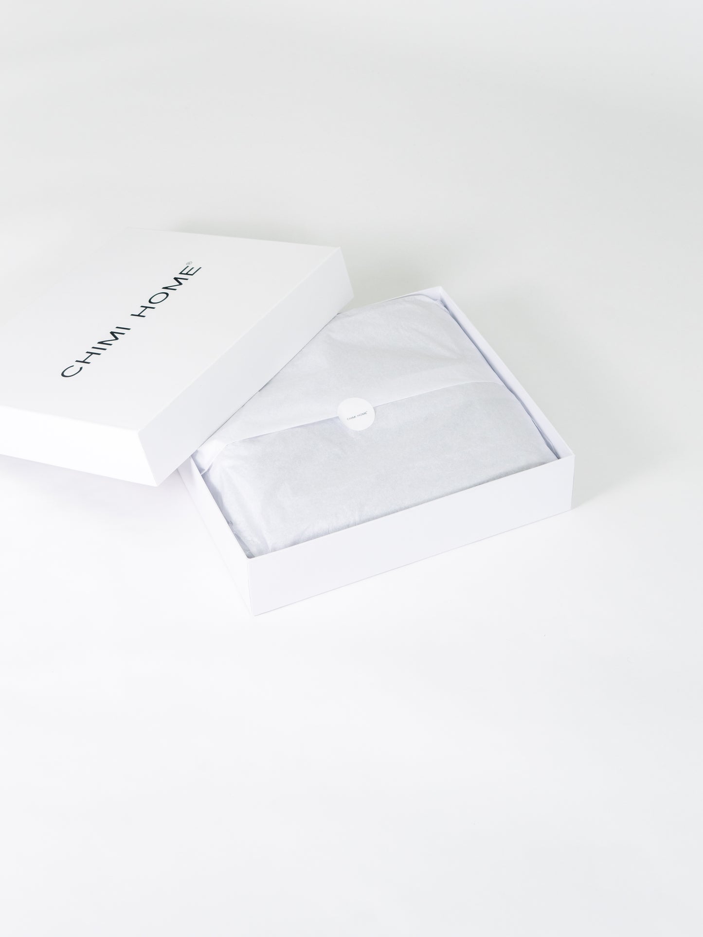 grått-handduksset-produktbild-chimi-home-frotté-giftbox-signature-collection