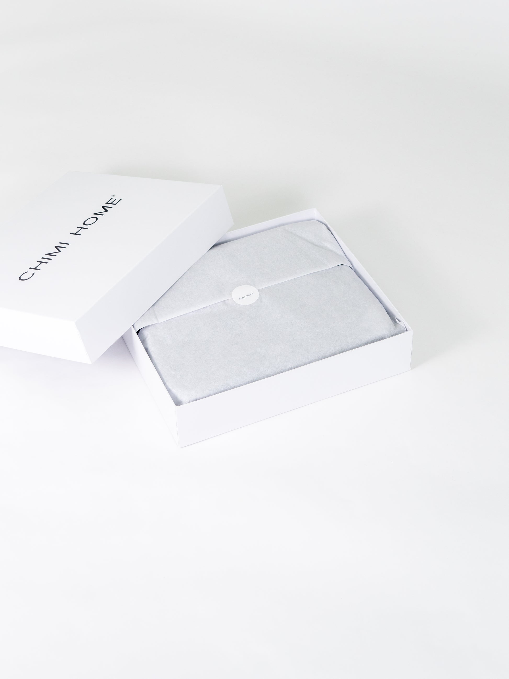blått-handduksset-produktbild-chimi-home-frotté-giftbox-signature-collection 