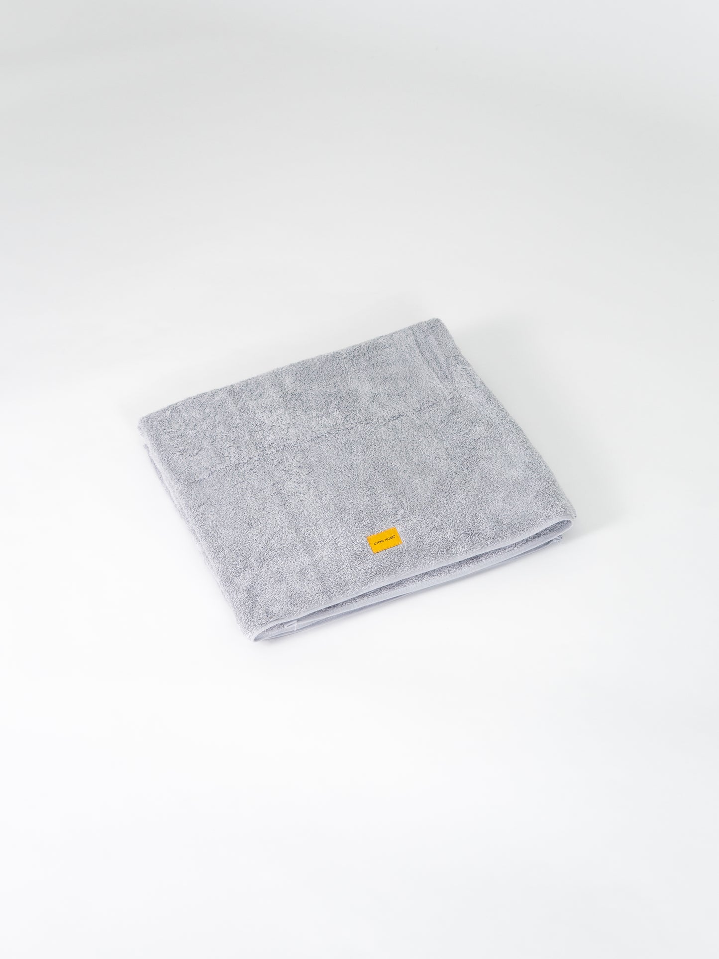 grått-handduksset-produktbild-chimi-home-frotté-signature-collection 