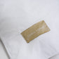 vita-sängkläder-produktbild-chimi-home-örngott-logga-närbild-rainbow-collection
